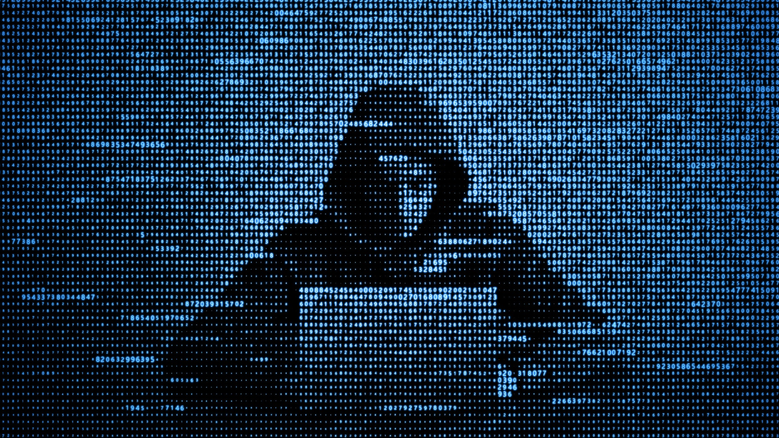 hackare framför dator som utför cyberattack